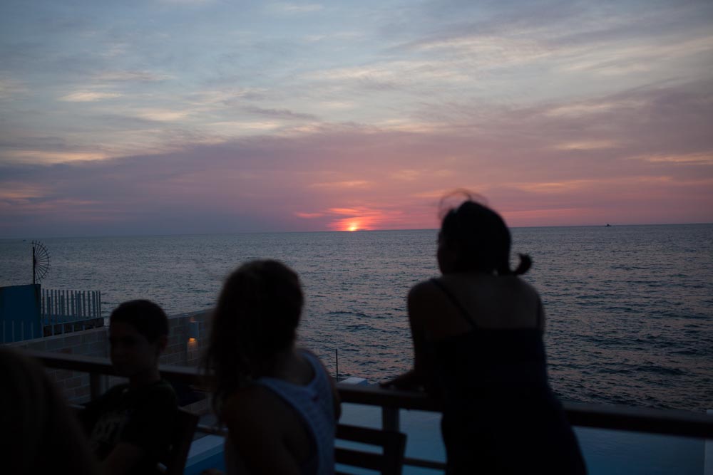Taking in a view of the sea from a local paladar, or privately-owned restaurant. | Photo by Trip Leader James Bernal